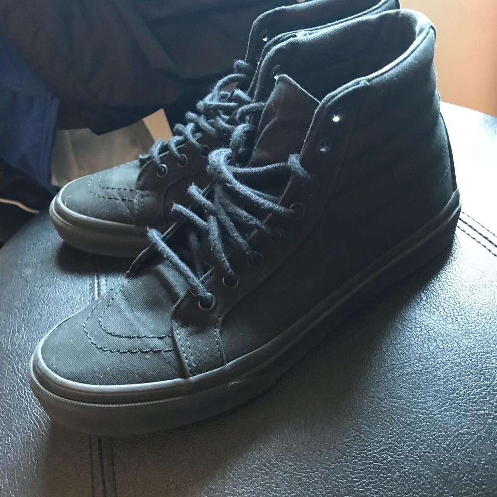 All black high top vans